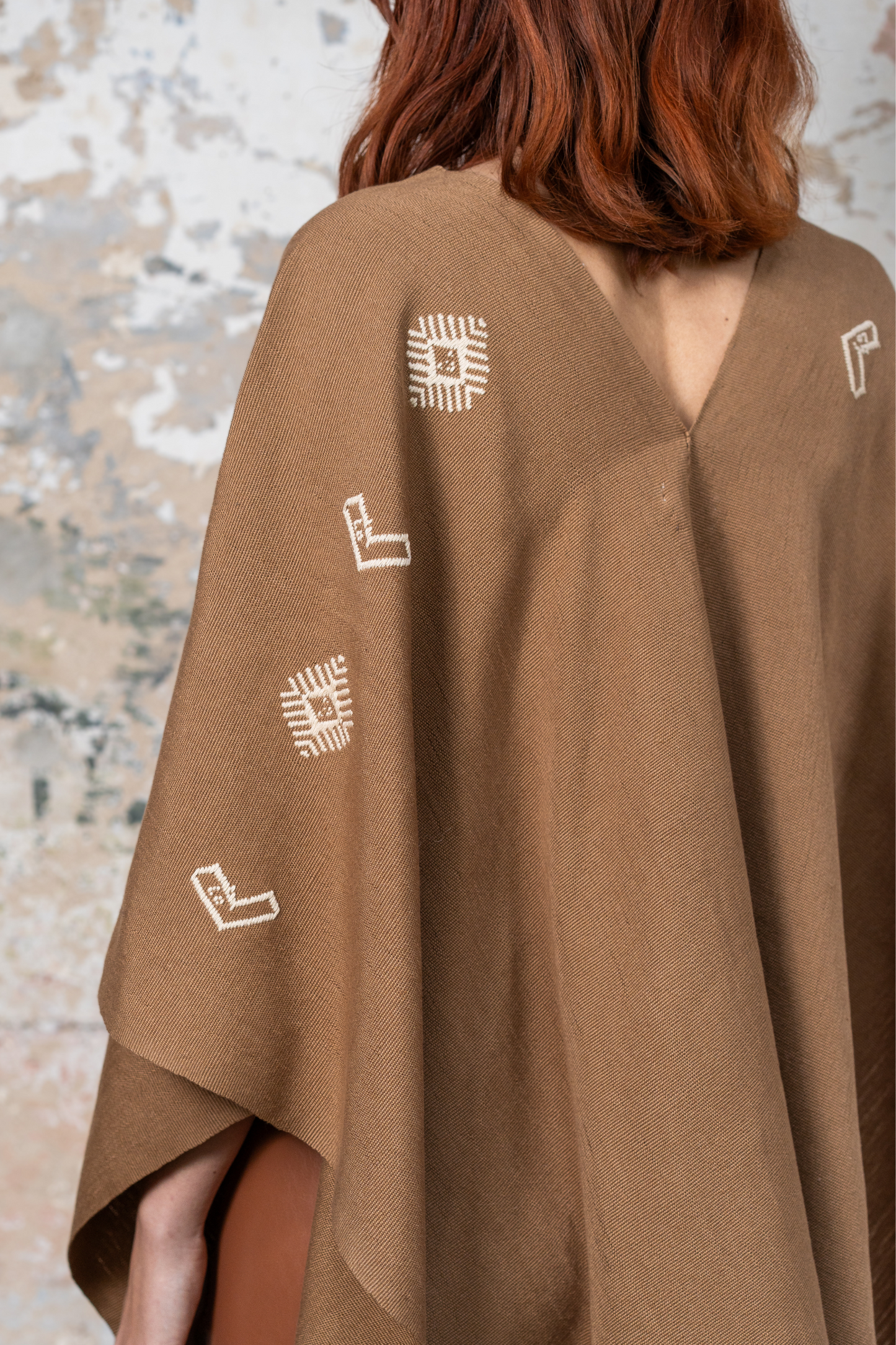 Batsichon/Schlangenponcho